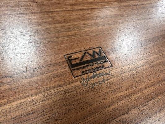 Our brand and the craftsman's signature that is placed on every custom piece we build