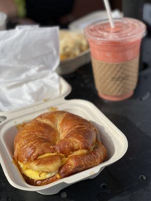 Chicken + Egg + Cheese breakfast sandwich on a croissant