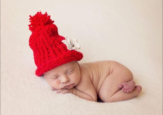 Asked her for pics with her little hat from the hospital... came out PRICELESS