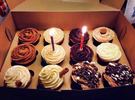 Why get a boring cake when you could get a bunch of different, beautiful, delicious cupcakes?