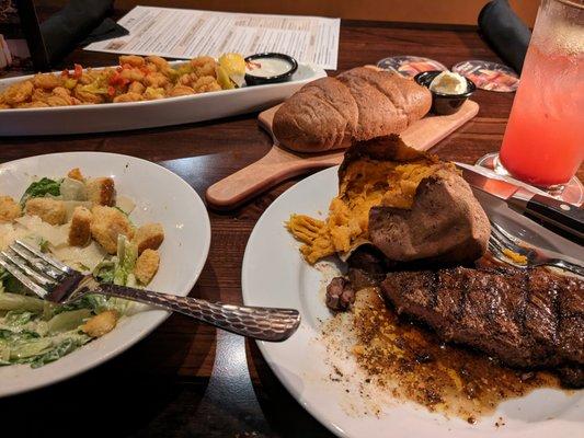 Newyork strip, sweet potato, Caeser salad. Appetizer wild west shrimp. Drink: Strawberry Lemonade