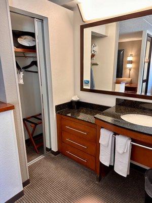 Bathroom area with closet