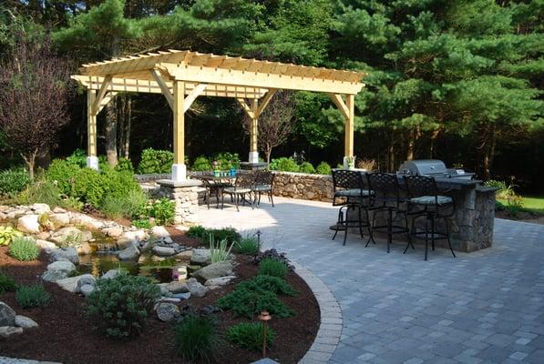 fish pond and outdoor kitchen