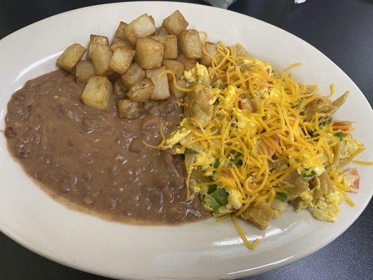 Migas a la Mexicana with refried beans and potatoes