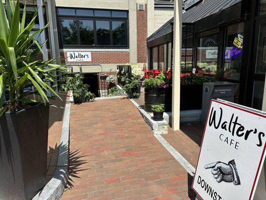 Entrance is next to the movie theater, in between Brickyard Hollow & Quikly Boba.