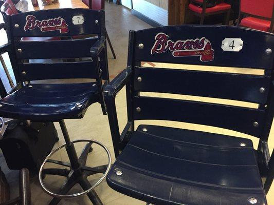 Bar stools look like old school stadium seats.