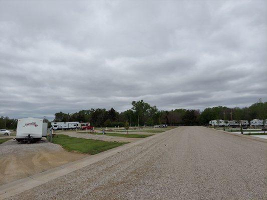 Long view of the Creek Side RV Resort. The concrete pads to the right are the few sites with fire rings.