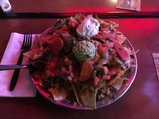 Carne Asada nachos (regular size) $13.  Huge shareable platter.