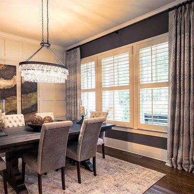 Layer shutters with drapery to add warmth and coziness to your space .