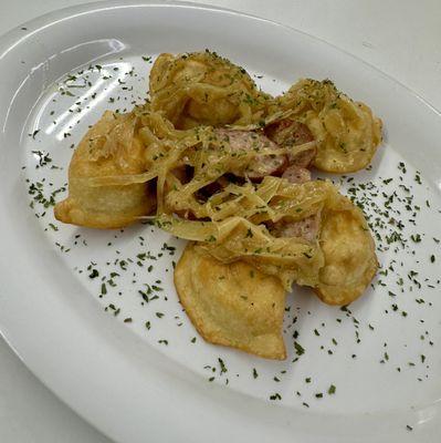 Deep Fried Pierogi with sausage and onions