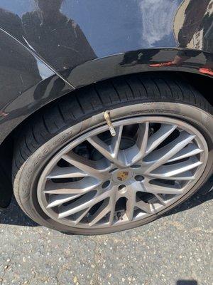 Tire punctured by 5 inch bolt from someone's brake caliper.