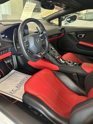 Interior of Lamborghini huracan convertible, and Lamborghini urus tires.