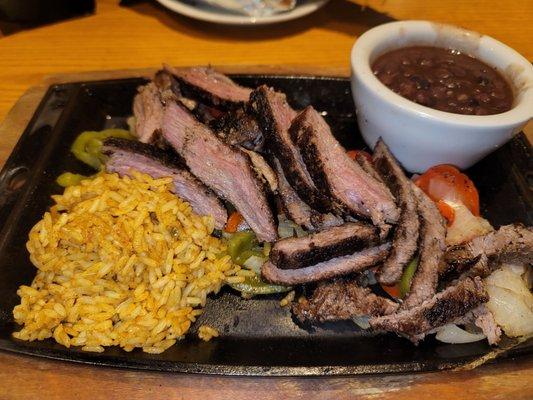 Sizzling steak fajitas