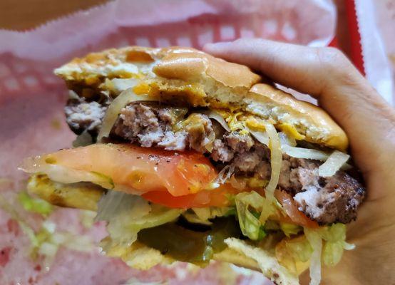 Supposedly a half pound burger cooked medium rare