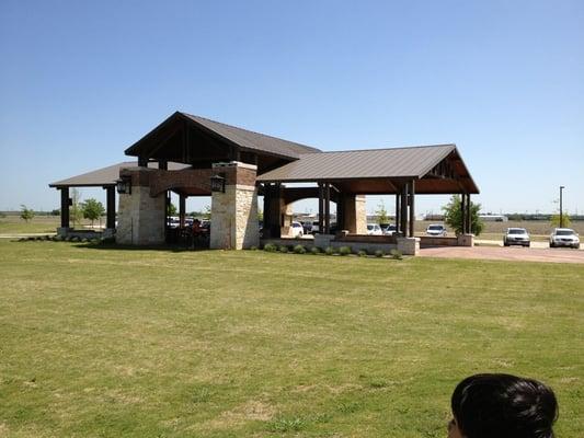 The pavilion includes 4 picnic tables and a huge shaded area for playing games or dancing. ;)