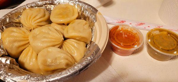 Momos and sauces taken home for dinner. Yummy!!