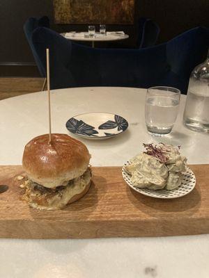 The burger with homemade potato salad