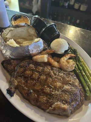 Surf and Turf Ribeye, Grilled Shrimp, Asparagus, & Loaded Potato