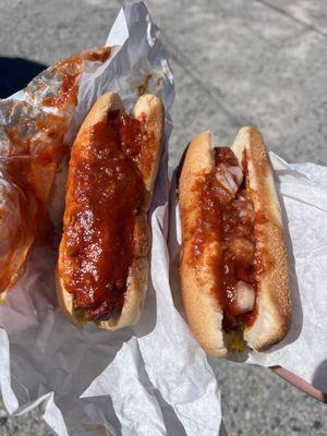 Hot dogs:
 Chili and mustard (left)
 Chili, mustard, and onion (right)