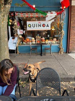 Outdoor seating - hanging out with friends and man's best.