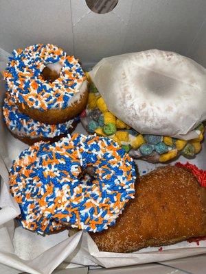 Astros World Series mini donuts, rhe blunt donut, oh captain my captain and a powdered sugar cake donut