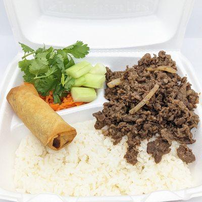 Bulgogi ribeye beef rice plate with an egg roll