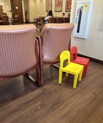 Cute chairs for kids in the waiting area.