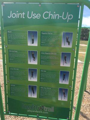 There is a station near the concrete walking trail. It claims you can do three activities there. Includes chin-ups.