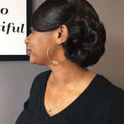 Side bang & side bun by Phyllis.