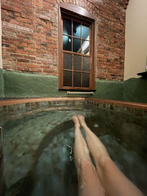 Enjoying the beautiful exterior brick wall and window