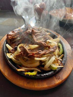 Sizzling steak fajitas