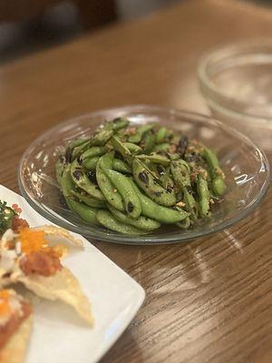 Spicy Edamame: Young soybeans sauteed with butter, toasted chilies, sea salt & roasted garlic | $8.95