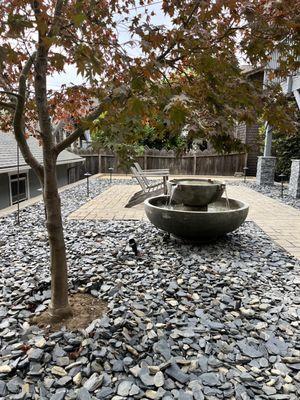 Slate rocks, fountain platform, and up-lighting for existing maple.