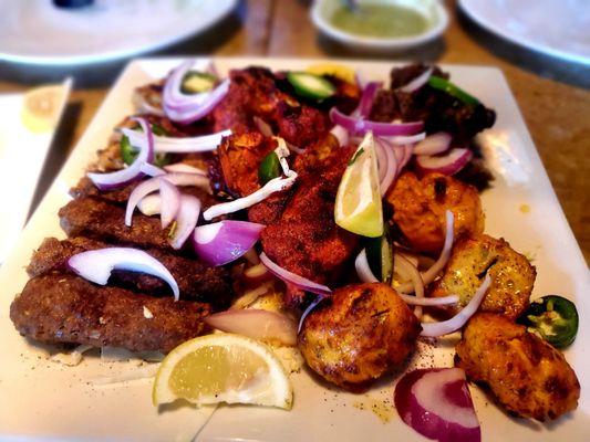 Palter of Beef kabob, chicken tandoori Tikka, lamb kabob.