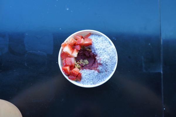 One Scoop açaí bowl. Strawberry and Chia Pudding topping. Honey and granola.