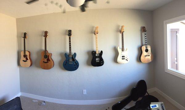 Brandon got the job done so quickly that he had time to help me hang my guitars!