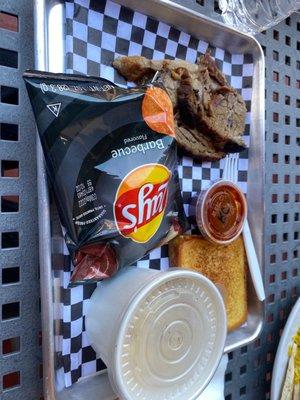 Brisket plate with Mac and Cheese and chips and Texas toast