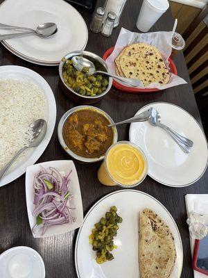 Chicken curry, bhindi, tawa roti, lassi