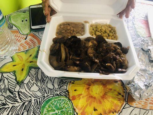 Mushroom steak, rice and butter peas.