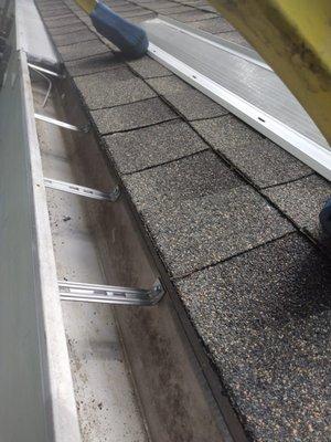 New roof and gutter guards