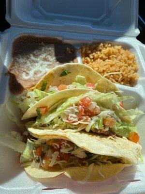 Ground beef 3 taco combo plate with rice and beans.