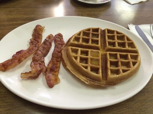 My Belgium Waffle, slathered with melted butter - opted out of powdered sugar with a side of bacon. Delicious! $3.50