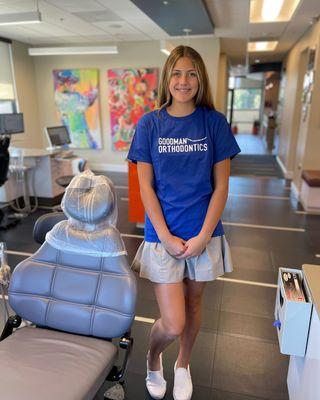 Rocking our branded tee while waiting for that perfect smile transformation!