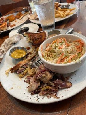 Reuben sandwich and coleslaw.