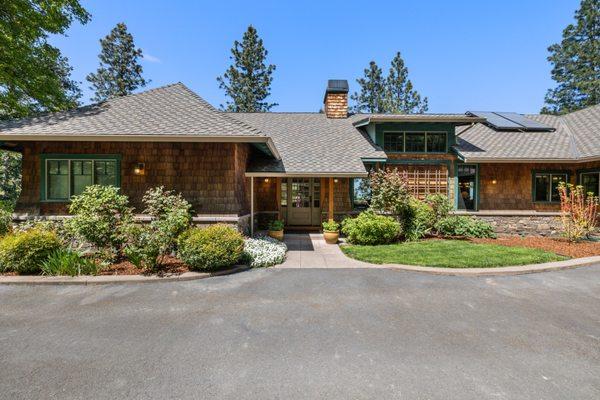 6969 Griffin Creek Rd. Spectacular custom Pacific Northwest-style home on 7+ acres with Table Rock views, greenhouse, animal corrals & more.