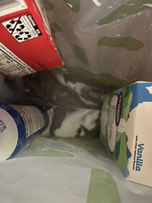 Delivery from Burbank. Opened milk soiled items in bag