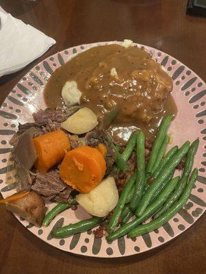 Pot roast with mashed potatoes and green beans with bacon.