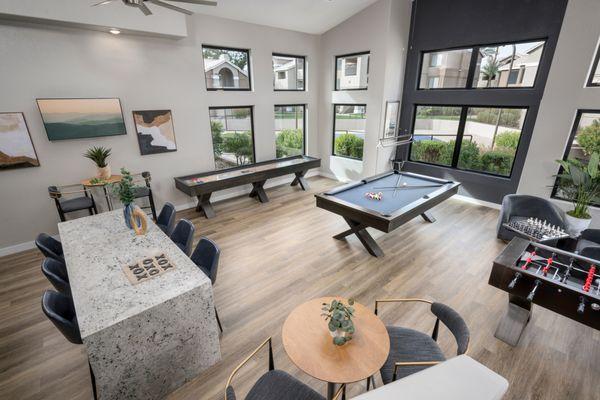 Game room with pool table and shuffle board at The Palisades in Paradise Valley