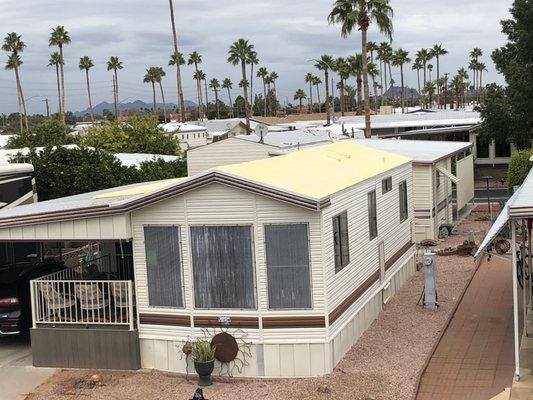 Foam roof installation over shingles, ready for white Top coating in the carriage manor in Mesa