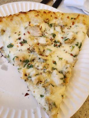 Chicken Alfredo Pizza slice.